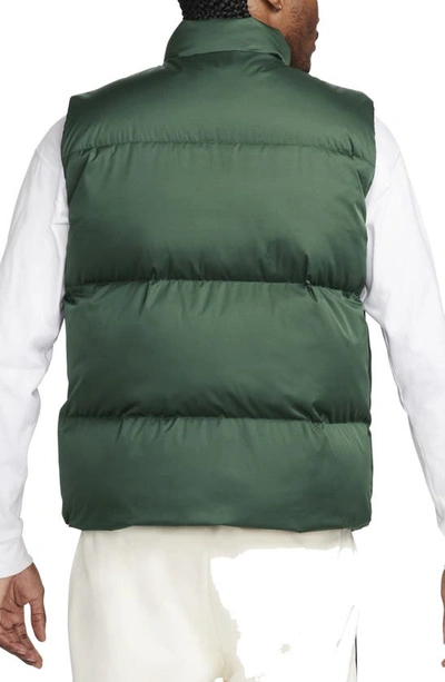 Shop Nike Club Water Repellent Primaloft® Insulated Puffer Vest In Fir/ White