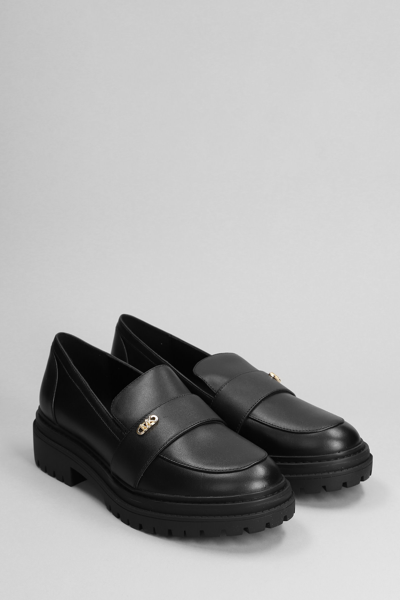 Shop Michael Kors Parker Lug Loafer Loafers In Black Leather