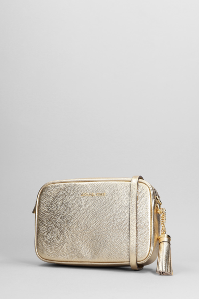 Shop Michael Kors Ginny Shoulder Bag In Gold Leather