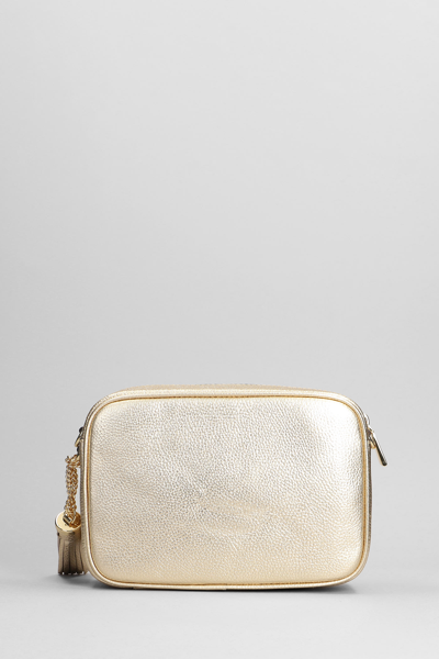 Shop Michael Kors Ginny Shoulder Bag In Gold Leather