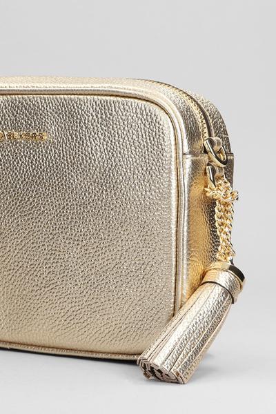 Shop Michael Kors Ginny Shoulder Bag In Gold Leather