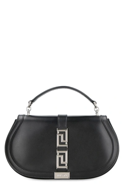 Shop Versace Greca Goddess Leather Crossbody Bag In Black