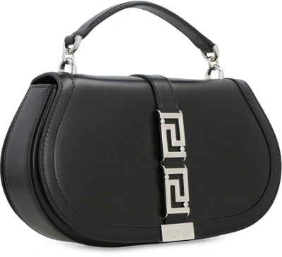 Shop Versace Greca Goddess Leather Crossbody Bag In Black