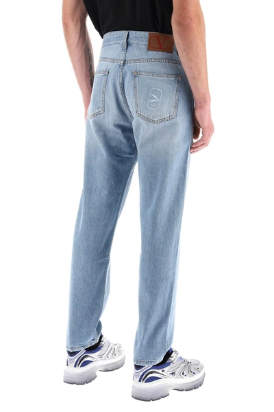 Shop Valentino Garavani Tapered Jeans With Medium Wash