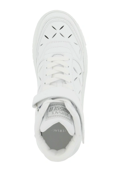Shop Versace 'odissea' Sneakers With Cut Outs