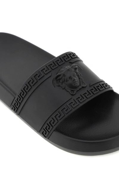 Shop Versace 'palazzo' Rubber Slides