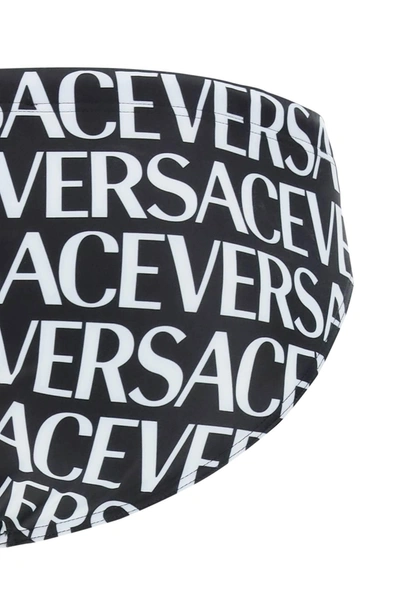 Shop Versace Allover Swim Briefs