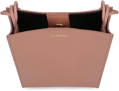 Shop Jil Sander Tangle Leather Crossbody Bag In Pink