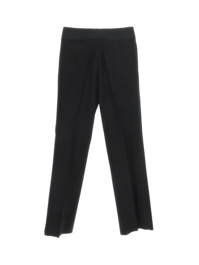 Shop Valentino Trousers In Nero