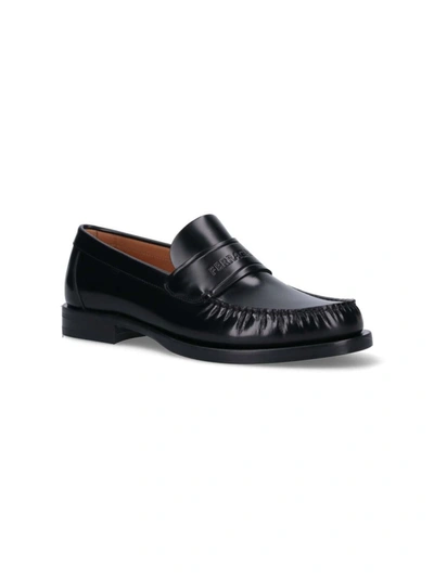 Shop Ferragamo Flat Shoes In Black