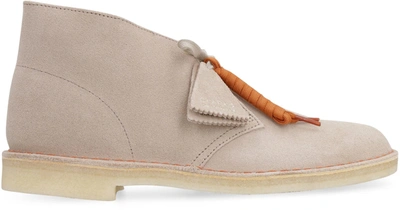 Shop Clarks Suede Desert Boots In Sand