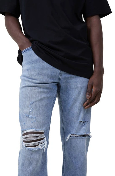 Shop Cotton On Ripped Knee Relaxed Tapered Jeans In Surf Blue Ripped