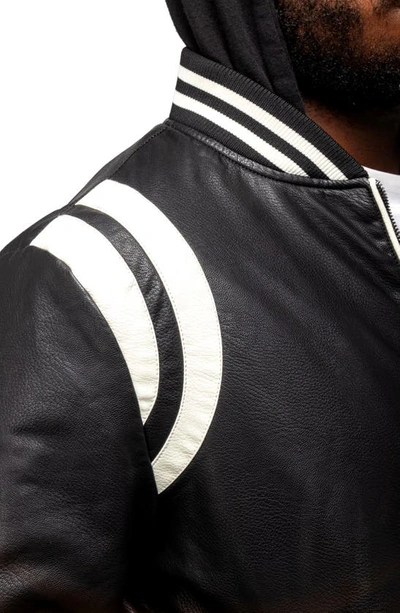 Shop X-ray Stripe Faux Leather Hooded Moto Jacket With Faux Fur Lining In Black/ White