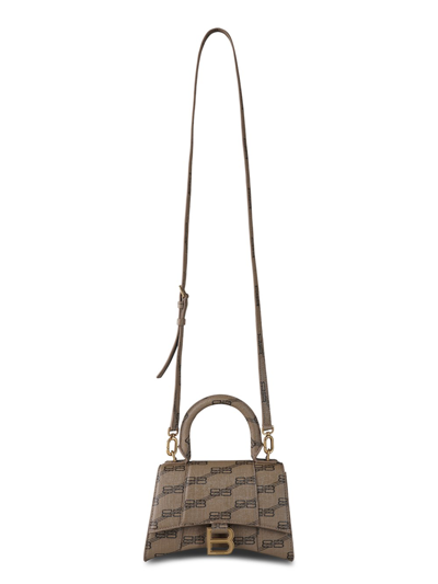 Shop Balenciaga Hourglass Bb Monogram Handbag In Brown