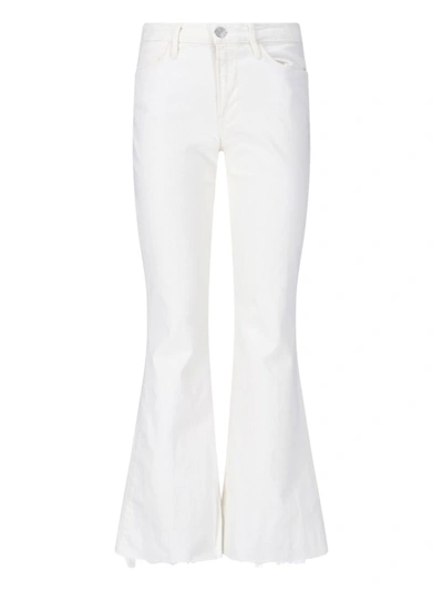 Shop Frame Jeans In White