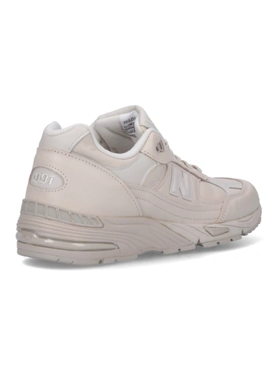 Shop New Balance Sneakers In White