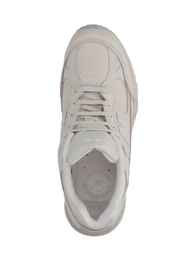 Shop New Balance Sneakers In White