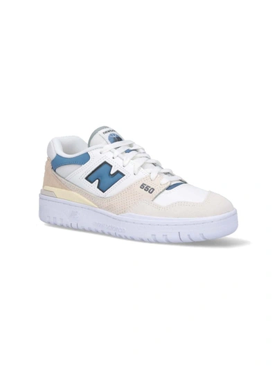 Shop New Balance Sneakers In White