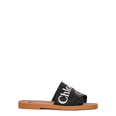 Chloé Woody Flat Logo Ribbon Slide Sandals In Black