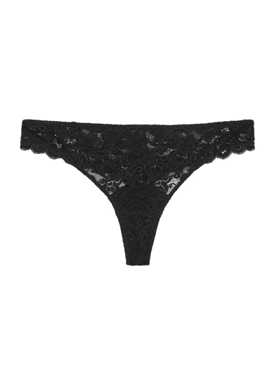 Shop Hanro Moments Lace Thong In Black