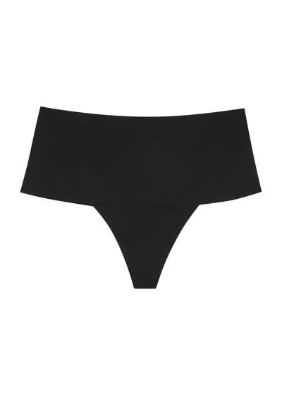 Shop Spanx Undie-tectable Seamless Thong In Black