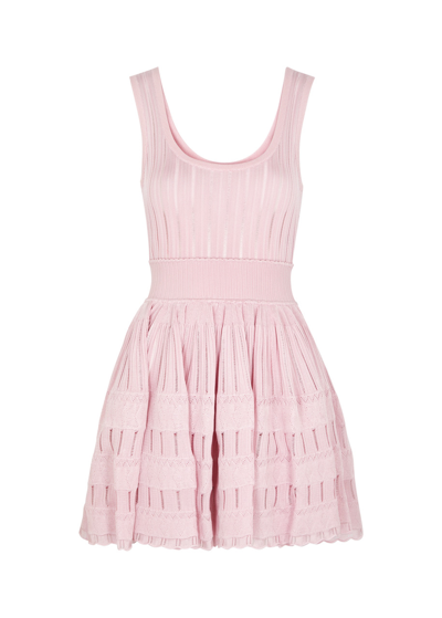 Shop Alaïa Fluid Knitted Mini Dress In Light Pink