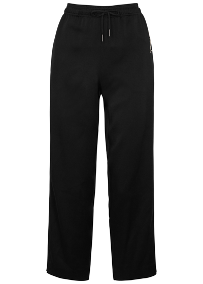 Shop Saint Laurent Logo-embroidered Cropped Satin Trousers In Black