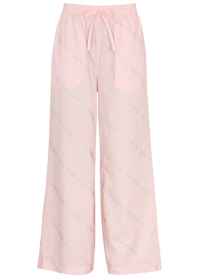 Shop Rotate Birger Christensen Rotate Sunday Logo-embellished Cotton-poplin Trousers In Light Pink