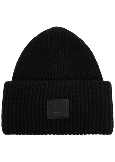 Shop Acne Studios Pansy Logo Ribbed Wool Beanie In Black