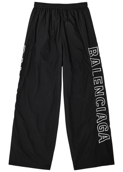 Shop Balenciaga Logo-embroidered Nylon Track Pants In Black