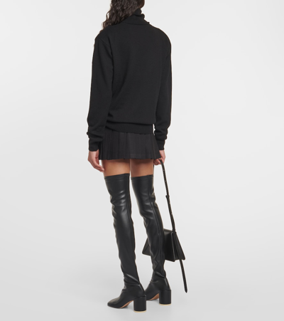 Shop The Frankie Shop Ines Wool Turtleneck Sweater In Black