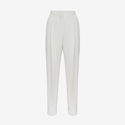 Shop Alexander Mcqueen Slim Peg Trousers In Optic White