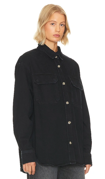 Shop Agolde Camryn Upsized Denim Shirt In Black