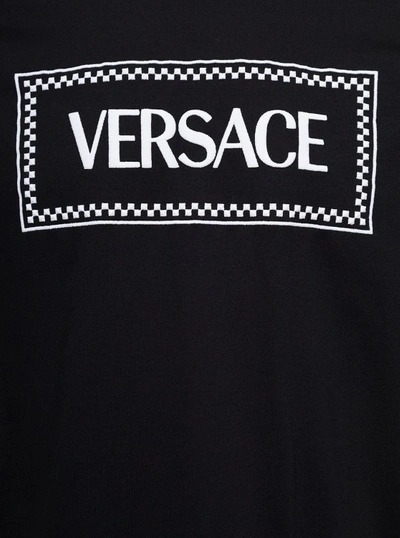 Shop Versace Black Crewneck T-shirt With Contrasting Logo Lettering Print In Cotton