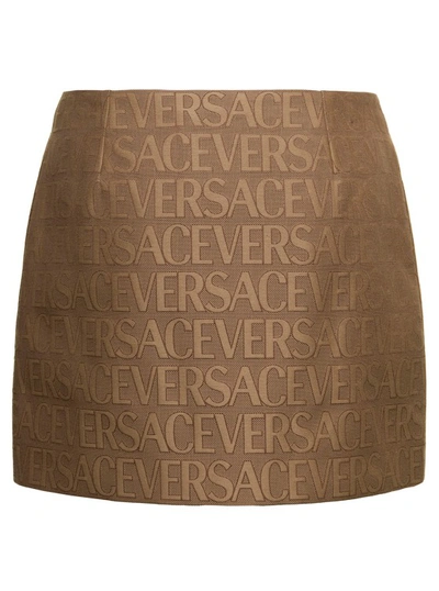 Shop Versace Brown Mini -skirt With All-over Logo Lettering Print In Canvas