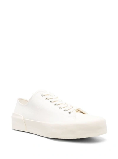 Shop Jil Sander White Lace-up Low Top Sneakers In Canvas