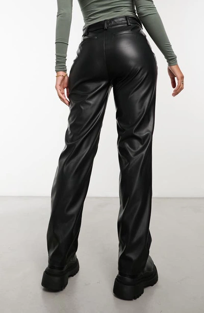 Shop Asos Design Faux Leather Straight Leg Trousers In Black