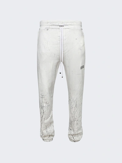 Shop Amiri Cracked Dye Logo Sweatpants White