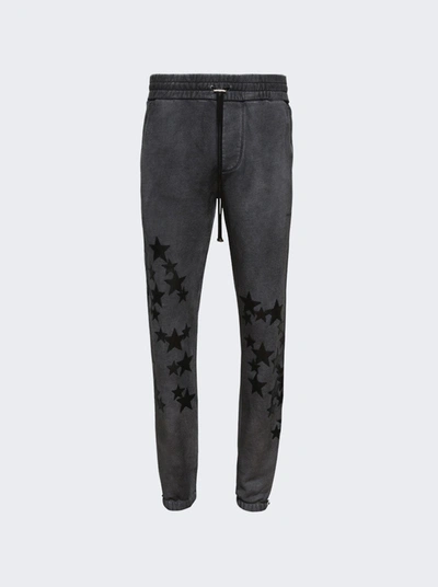 Shop Amiri Pigment Spray Star Sweatpants In Grey