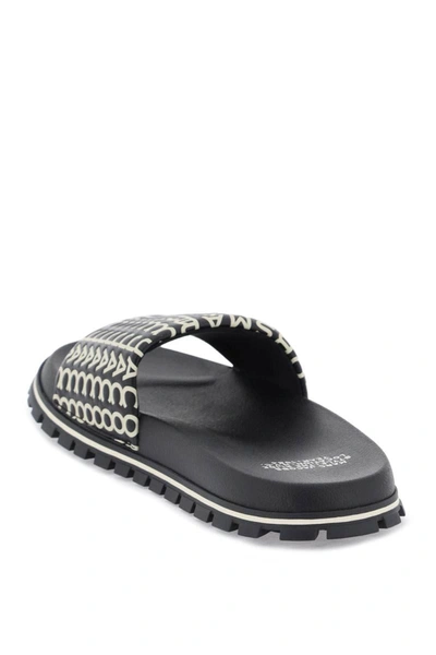 Shop Marc Jacobs The Monogram Slide In Black