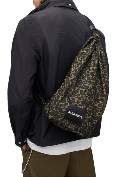 Shop Allsaints Kaito Duffle Sling Bag In Leopard
