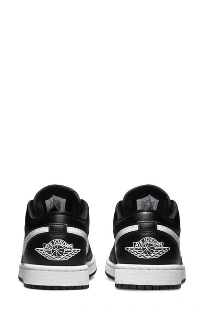 Shop Jordan Air  1 Low Sneaker In Black/ White/ Black