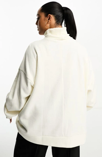 Shop Asos Design Curve Oversize Turtleneck Sweater In White