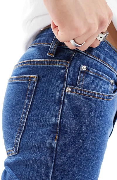 Shop Asos Design Skinny Jeans In Medium Blue
