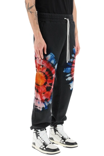 Shop Amiri Spot Tie Dye Jogger Pants In Black