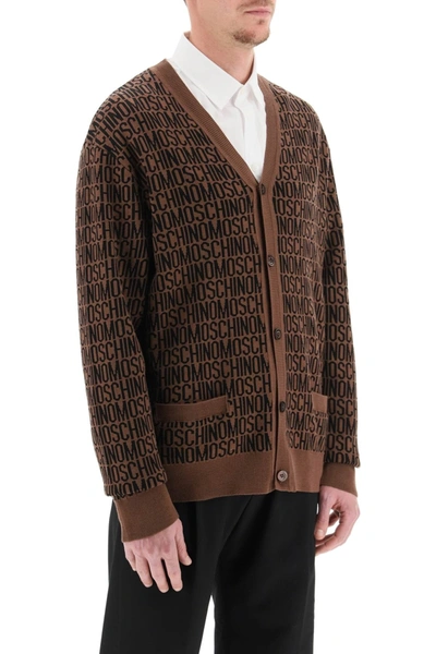 Shop Moschino All Over Logo Cardigan In Brown