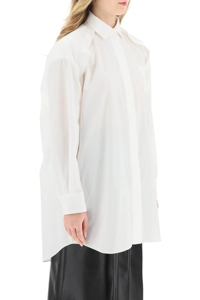 Shop Sacai Maxi Shirt With Cut Out Sleeves In White