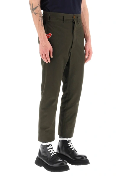 Shop Vivienne Westwood Cropped Cruise Pants Featuring Embroidered Heart-shaped Logo Men In Green