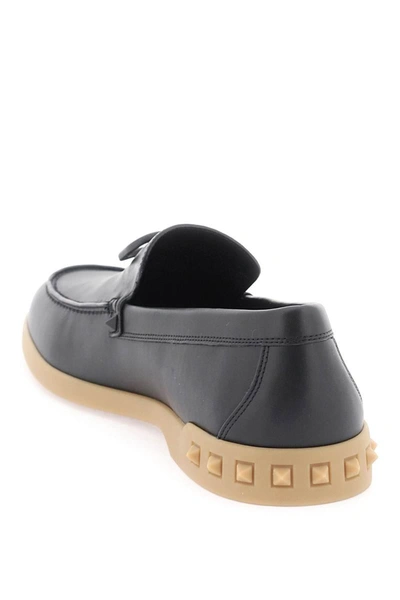 Shop Valentino Garavani Leisure Flows Leather Loafers In Black