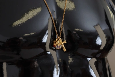 Shop Dolce & Gabbana Elegant Gold Tone Charm Necklace With Cross Women's Pendant